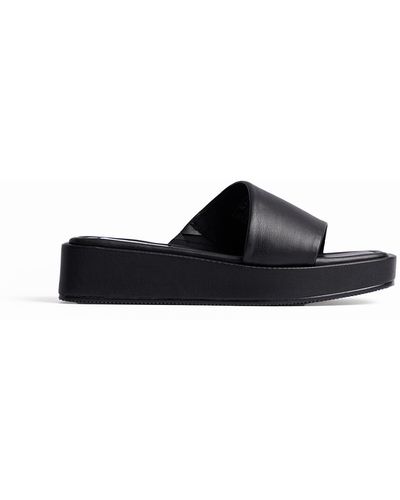 NA-KD Shoes Gewatteerde Platte Pantoffels - Zwart