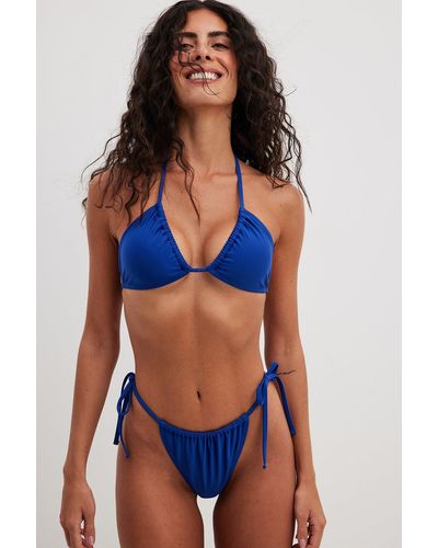 NA-KD Swimwear Hoog Uitgesneden Bikinibroekje Met Trekkoordstrik - Blauw