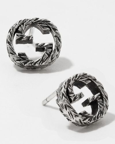 Gucci Stud Earrings With Interlocking G Motif In Aged Sterling Silver - Metallic