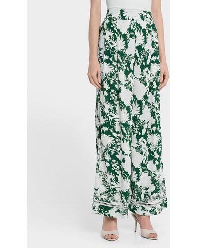 Figue Charlotte Floral-print Pleated Wide-leg Pants - Green
