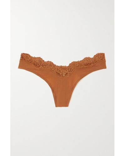 Beige After Hours Thong by SKIMS on Sale