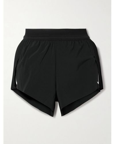 https://cdna.lystit.com/400/500/tr/photos/net-a-porter/16d484b7/nike-Black-Printed-Plisse-Dri-fit-Adv-Shorts.jpeg