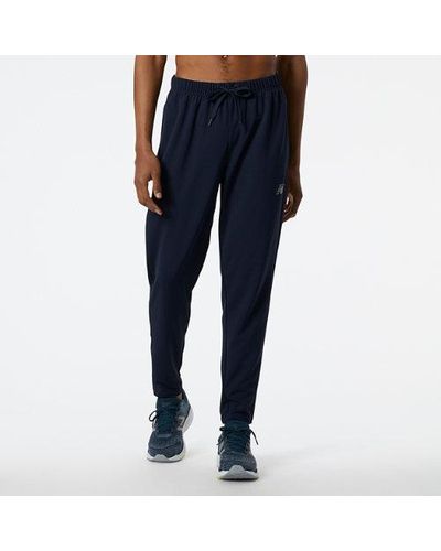 New Balance Homme Pantalons Nb Tech Training Knit Track En, Poly Knit, Taille - Bleu