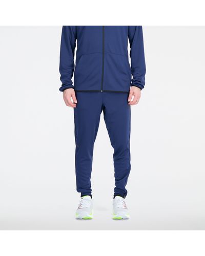 New Balance Tenacity knit training pant in blau