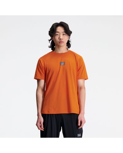 New Balance Impact Run At N-vent Short Sleeve In Red Poly Knit - Orange