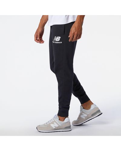 New Balance Pantalons de Jogging Sport Seasonal Homme Gris