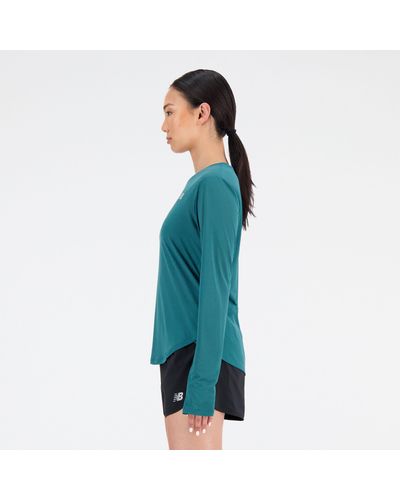 New Balance Accelerate long sleeve top in verde - Blu