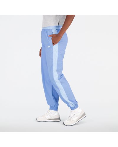 New Balance Pantaloni athletics remastered woven pant in blu