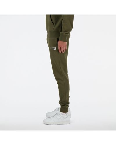 New Balance Pantaloni nb classic core fleece in verde