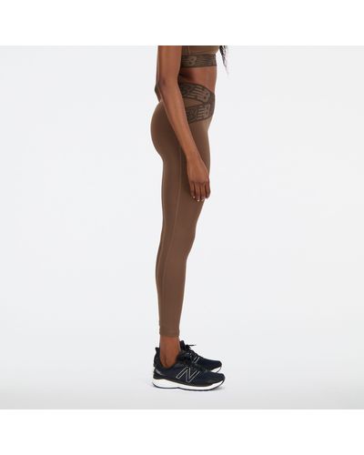 New Balance Relentless crossover high rise 7/8 leggings in braun