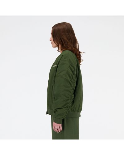 New Balance Linear heritage woven bomber jacket in grün