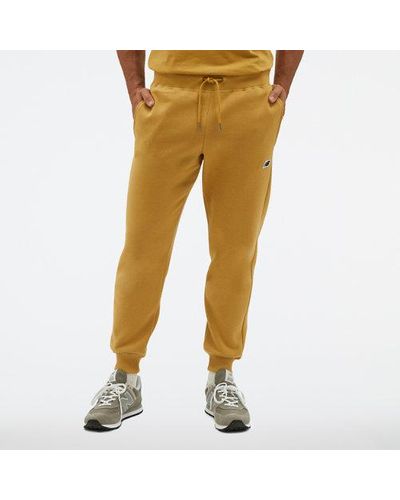New Balance Homme Pantalons Nb Small Logo En, Cotton, Taille - Jaune