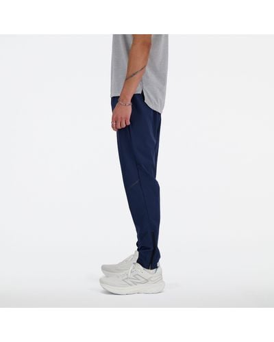 New Balance Tenacity Stretch Woven Pant In Blue Polywoven