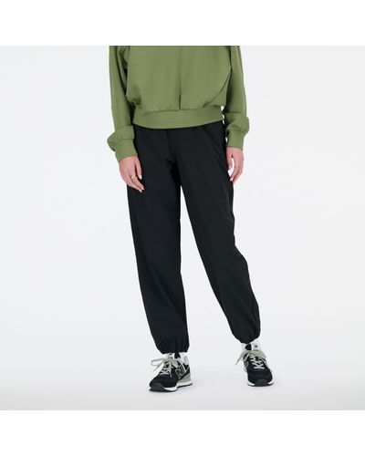 New Balance Athletics Stretch Woven jogger In Black Poly Knit