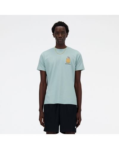 New Balance Sport essentials barrel runner t-shirt in verde - Blu