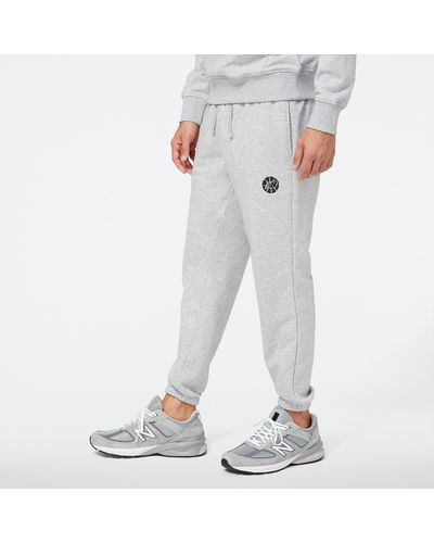New Balance Pantaloni nb hoops essentials fundamental in grigio