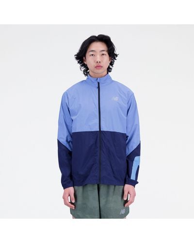 New Balance Graphic impact run packable jacket in blu