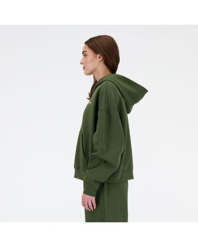 New Balance Linear heritage brushed back fleece hoodie in grün