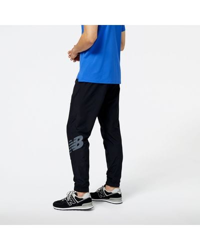 New Balance Pantaloni tenacity woven in nero - Blu