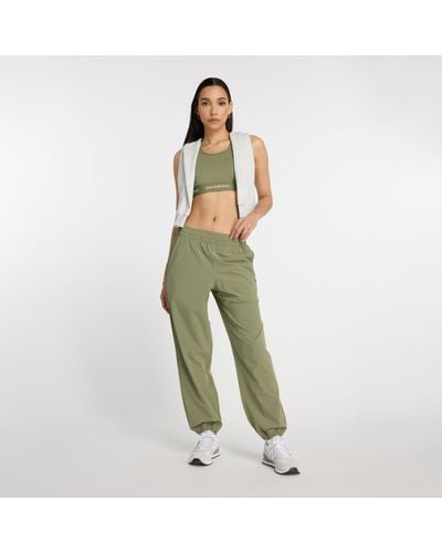 New Balance Athletics Stretch Woven jogger In Green Poly Knit - Black