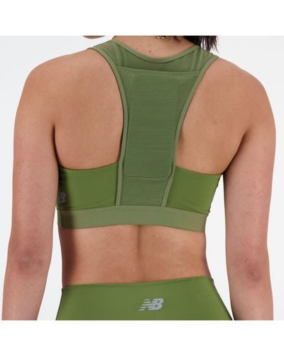 New Balance Nb Sleek Medium Support Pocket Sports Bra In Green Poly Knit