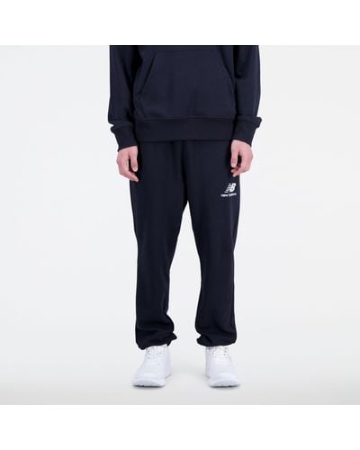 New Balance Pantaloni da tuta essentials stacked logo french terry sweatpant in nero - Blu