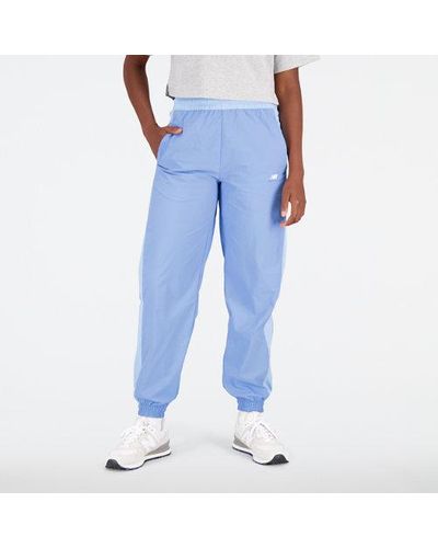 New Balance Femme Pantalons Athletics Remastered Woven Pant En, Polywoven, Taille - Bleu