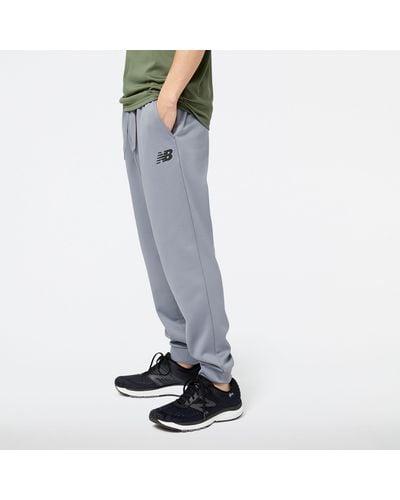 New Balance Pantaloni tenacity performance fleece in grigio