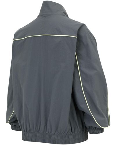 New Balance Linear heritage woven jacket in grau