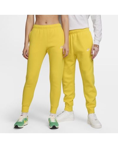 Nike Pantaloni jogger sportswear club fleece - Giallo