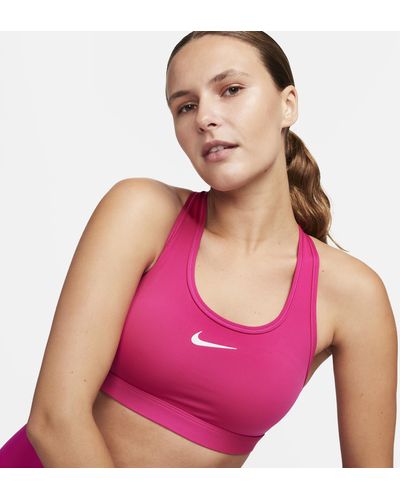 Nike Training Air Indy strappy logo binding light support sports bra in pink
