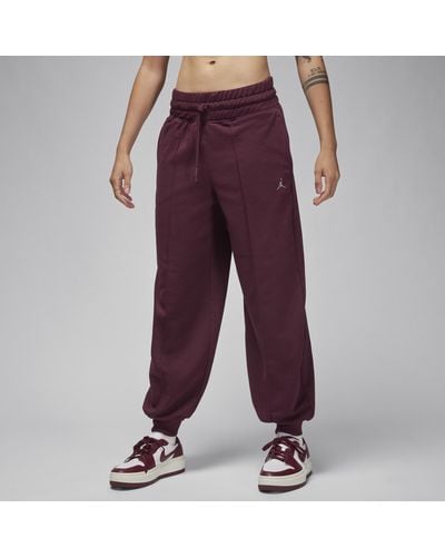 Nike Pantaloni in fleece con grafica jordan sport - Viola