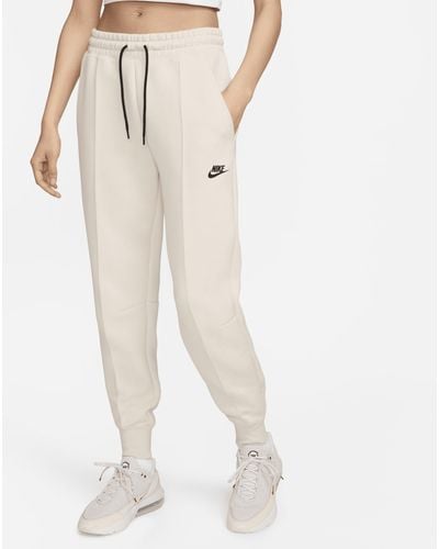 Nike Pantaloni jogger a vita media sportswear tech fleece - Neutro