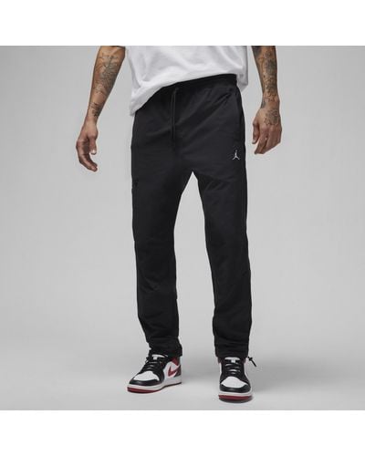 Nike Pantaloni in tessuto jordan essentials - Nero