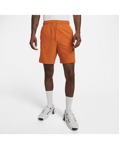 Nike Unlimited Multifunctionele Niet-gevoerde Shorts Met Dri-fit (18 Cm) - Oranje