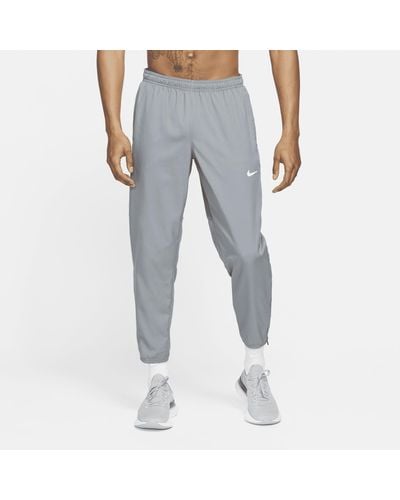 Nike Pantaloni da running in tessuto dri-fit challenger - Grigio