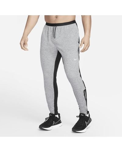 Nike Pantaloni da running therma-fit run division phenom elite - Grigio