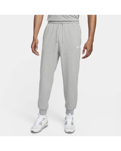 Nike Pantaloni jogger in maglia club - Grigio