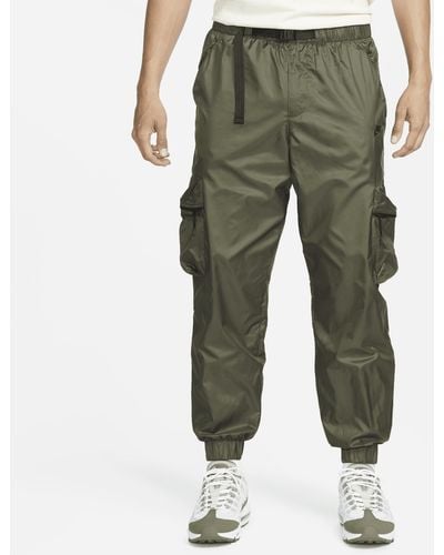 Nike Pantaloni in tessuto con fodera tech - Verde