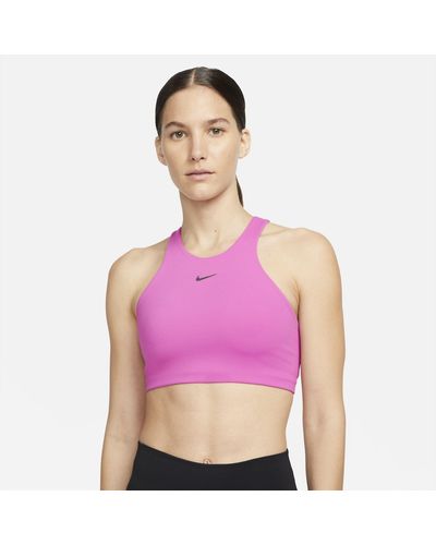 Nike Bra a sostegno medio con fodera leggera yoga alate curve - Rosa