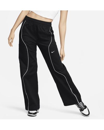 Nike Pantaloni a vita alta in tessuto sportswear - Nero