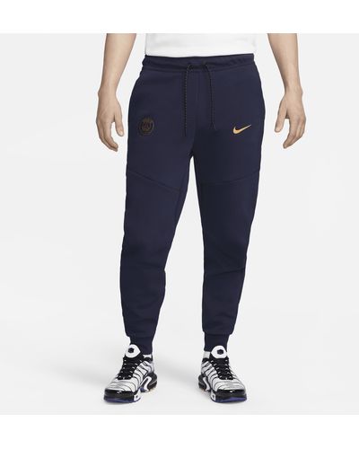 Nike Pantaloni jogger paris saint-germain tech fleece - Blu