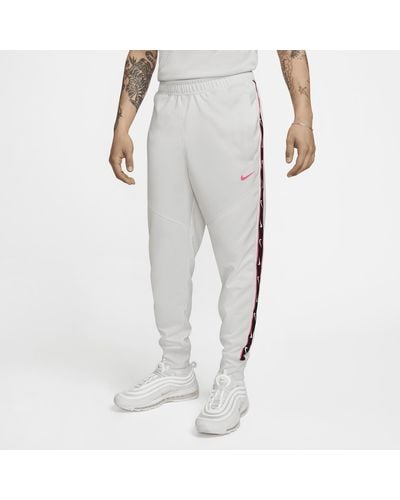 Nike Pantaloni jogger sportswear repeat - Grigio