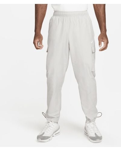 Nike Pantaloni in tessuto sportswear repeat - Bianco