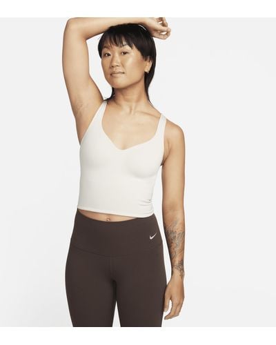Nike Canotta con bra imbottito a sostegno medio alate - Bianco