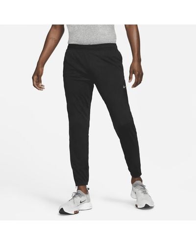 Nike Pantaloni da running in maglia dri-fit challenger - Nero
