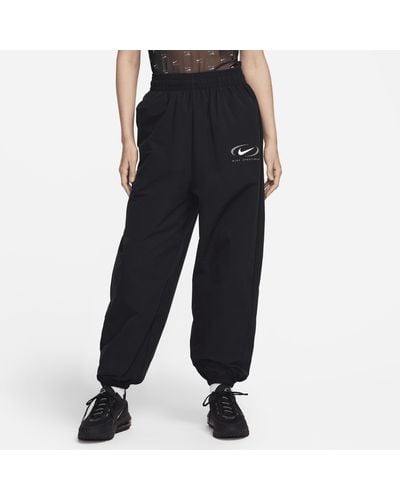 Nike Pantaloni jogger in tessuto sportswear - Nero
