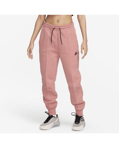 Pink Nike Track pants and sweatpants for Women | Lyst