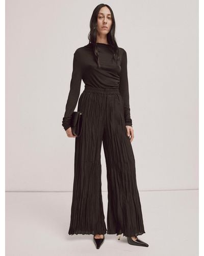 NINETY PERCENT Cida Trousers In Black