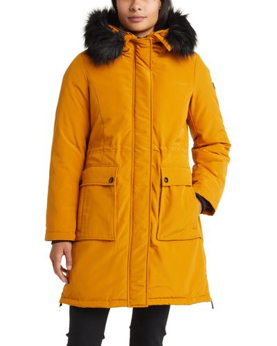 Orange Parka coats for Women | Lyst